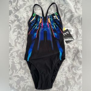 Women’s TYR bathing suit.  32 in swimsuit sizes.  This is not a plus size suit.